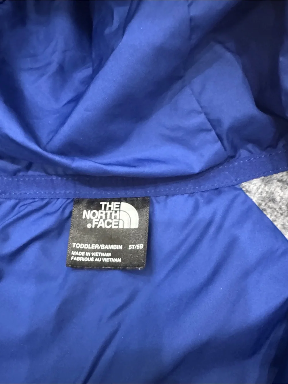 The North Face Royal Blue Quilted Hooded Jacket with Gray Sleeves